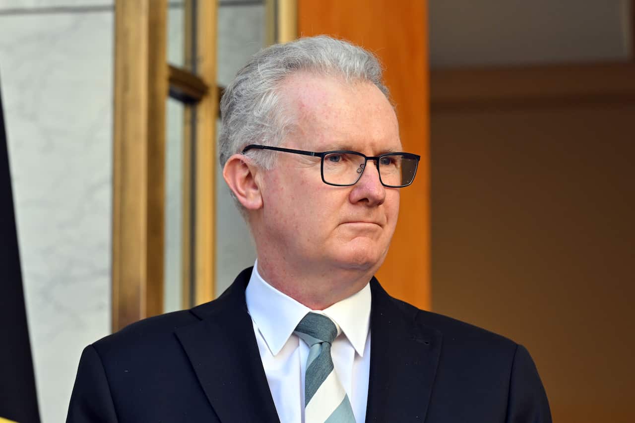 A man wearing a suit and tie.