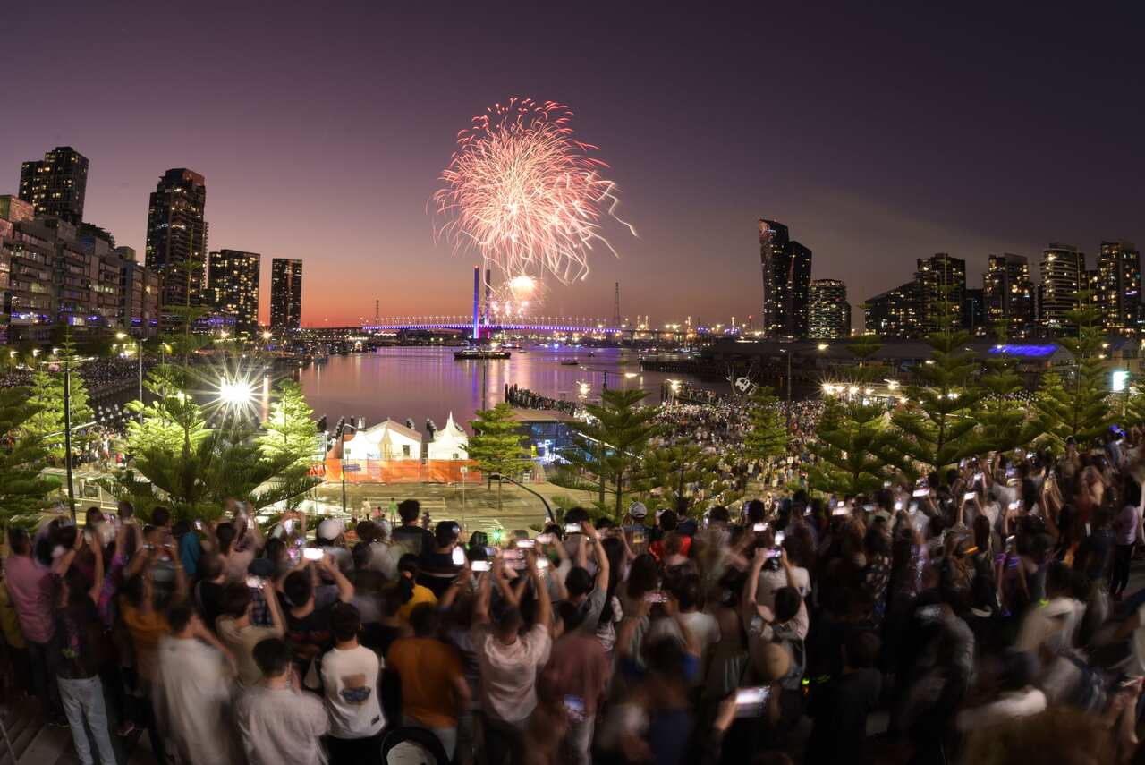 A large number of people watching fireworks at Dockland Marvel Stadium Melbourne