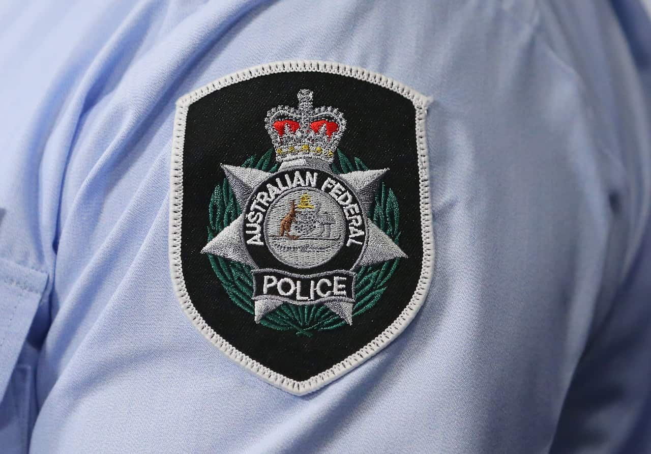 The Australian Federal Police badge on a shirt.
