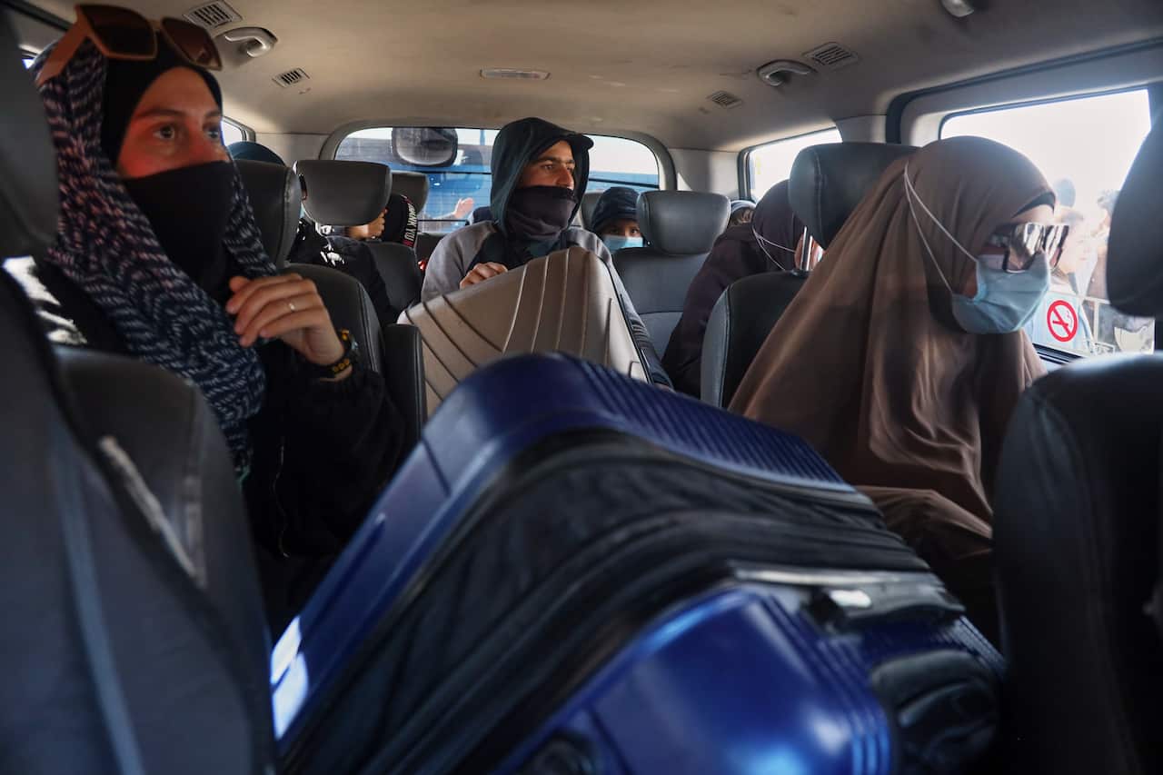 Veiled women in a minibus