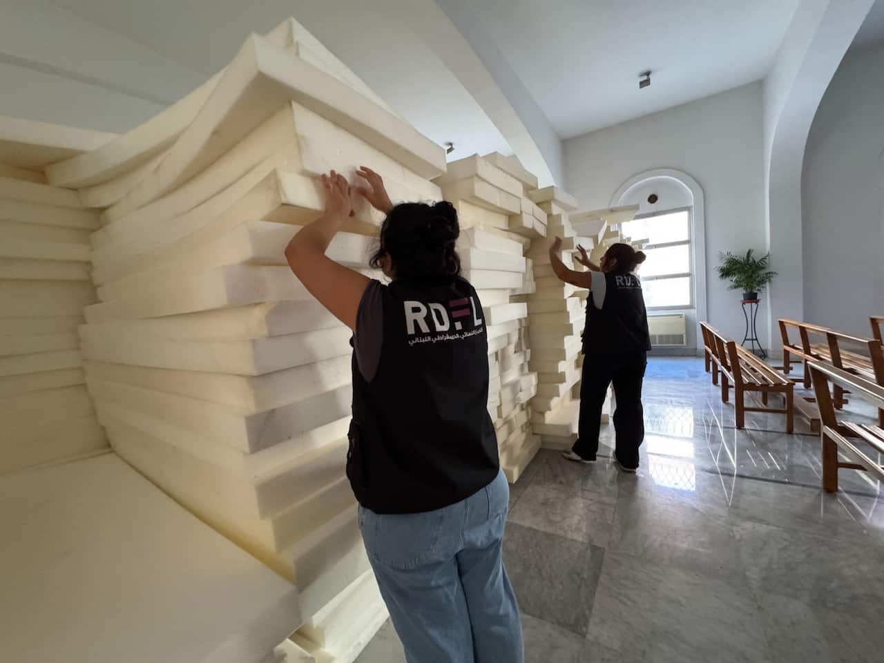 ActionAids partner RDFL distributes mattresses in Beirut .jpeg