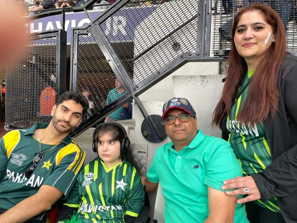 Simra is watching cricket with family.jpeg