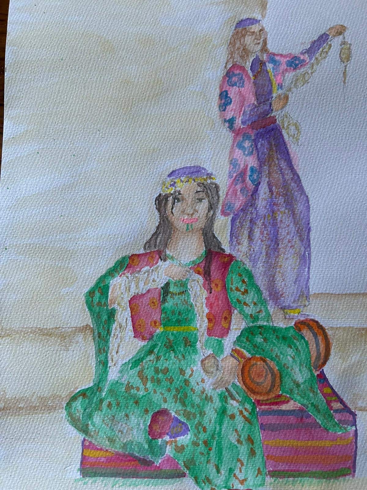 Kurdish women in traditional outfit.png