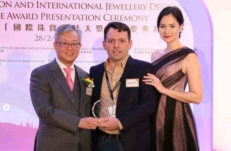 Roberto Mattei receiving a prize at the International Jewellery Show.