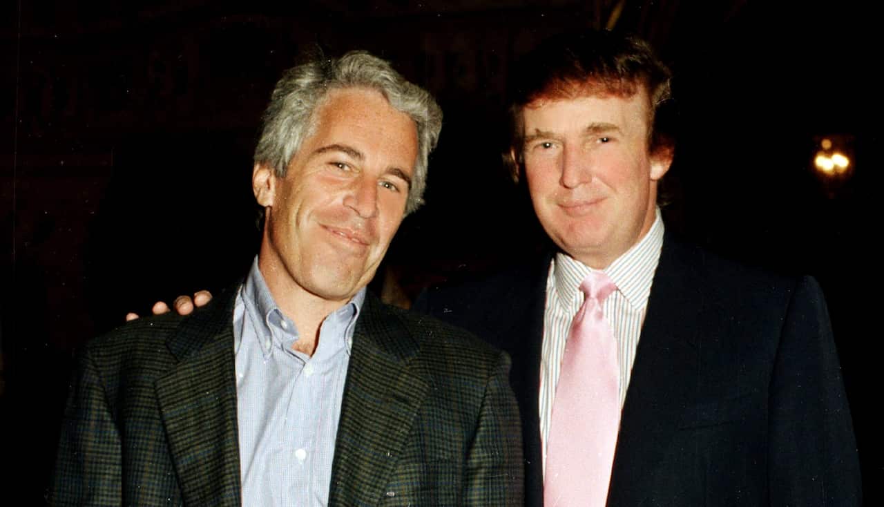 Jeffrey Epstein and Donald Trump standing side by side, smiling and wearing suits.