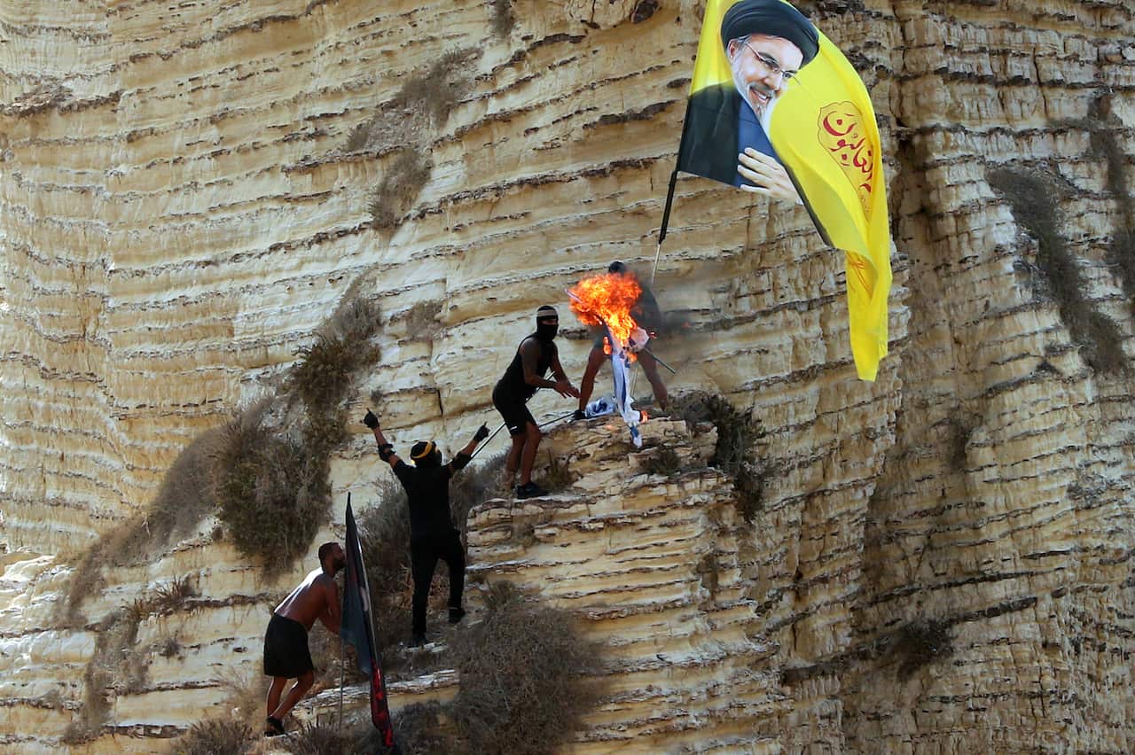 Rally on first anniversary of Hezbollah leaders Nasrallah and Safieddine death in Beirut