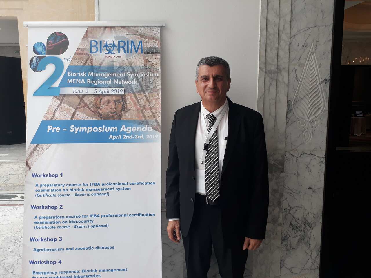 Dr Sayegh attending a conference in Tunusia 2019.png