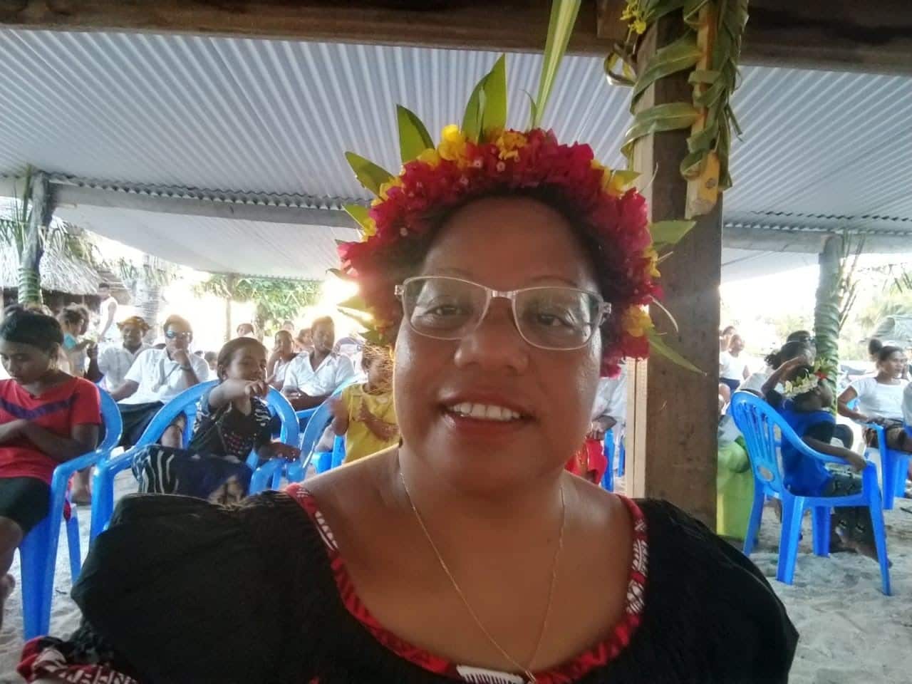 A woman smiling.