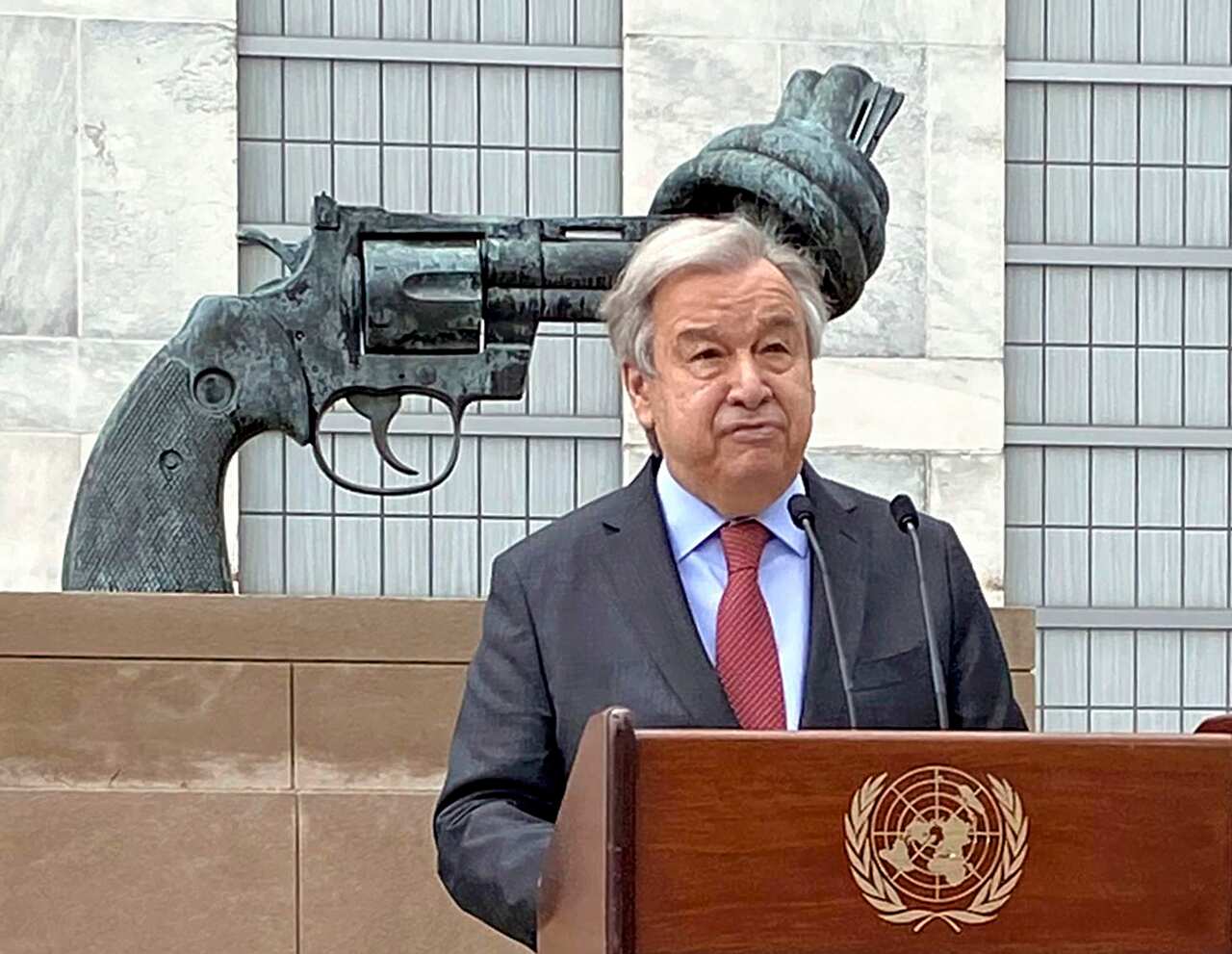 A man standing at a lectern.