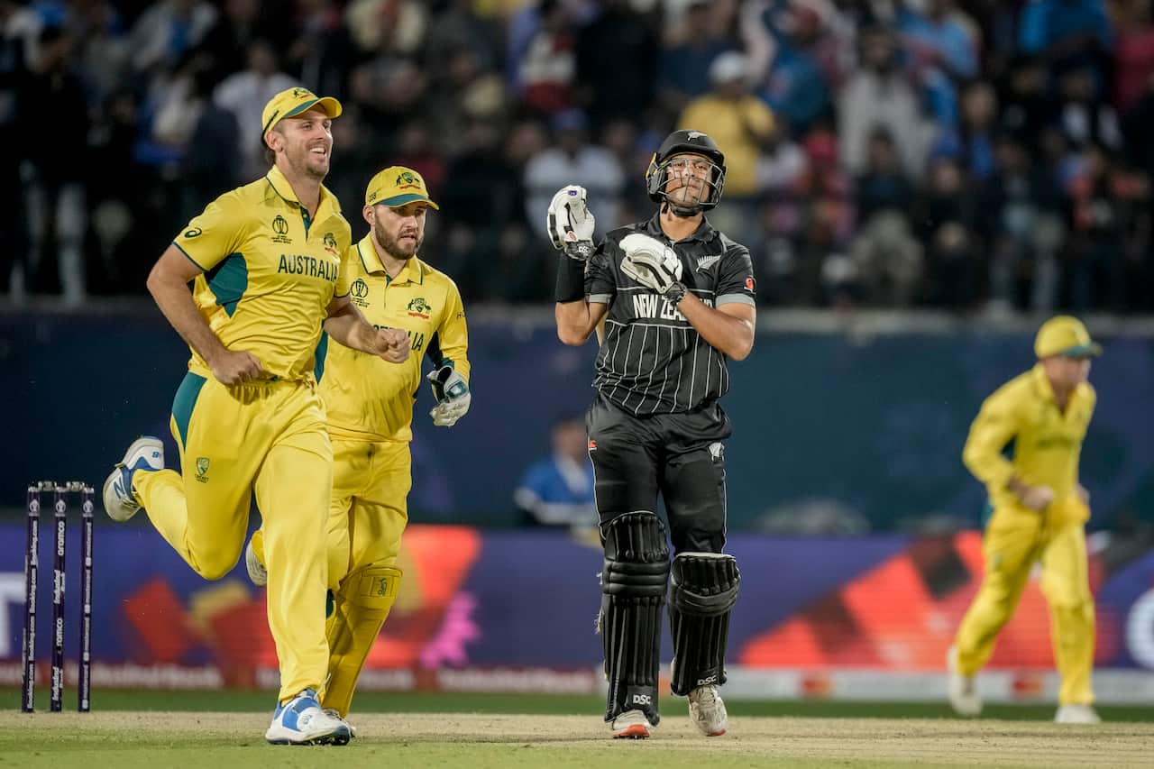 New Zealand's Rachin Ravindra (C) during the ICC Men's Cricket World Cup match between Australia and New Zealand in Dharamshala, India on Saturday, 28 October 2023. 