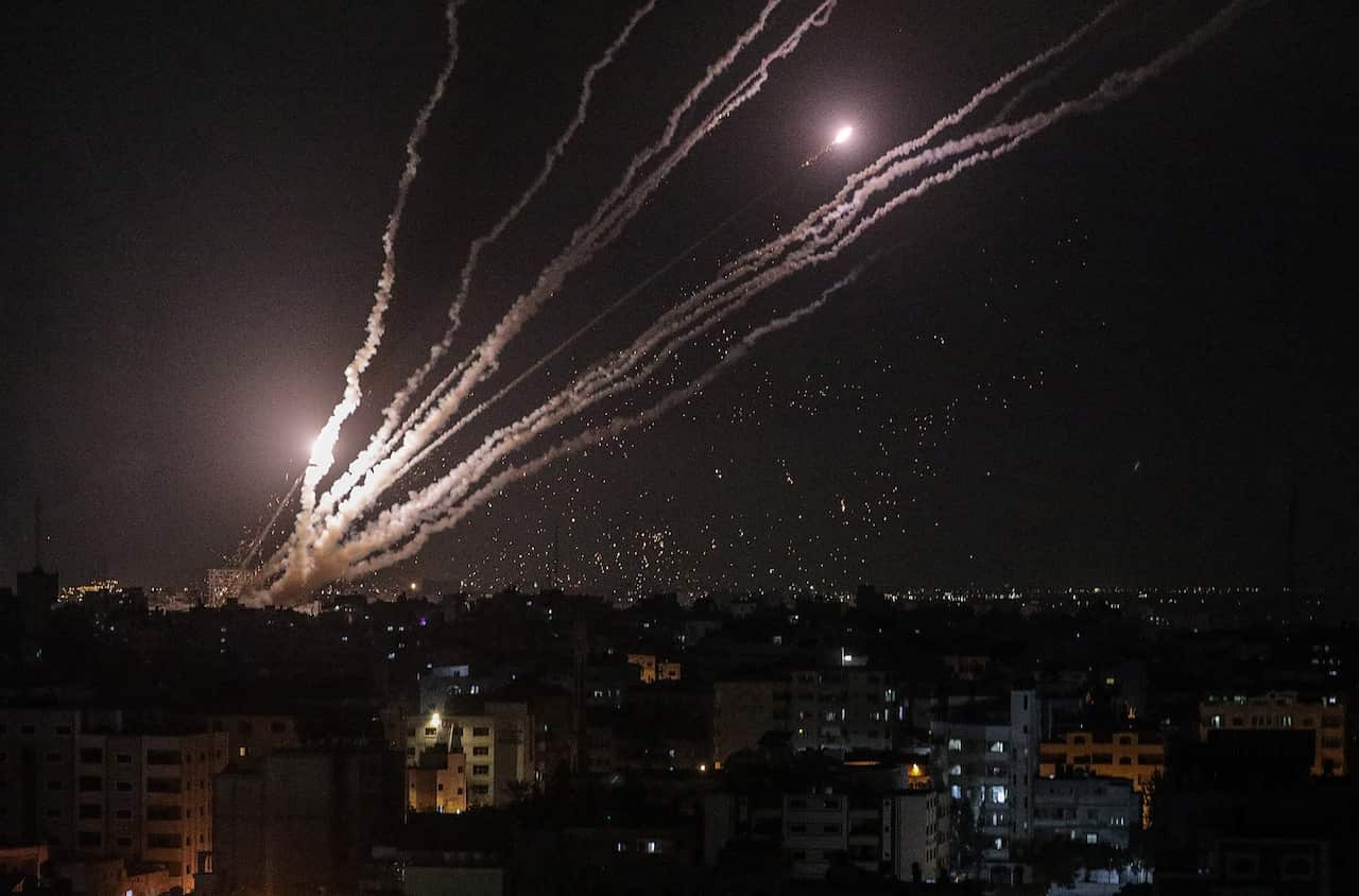  Rockets are fired by fighters from Al-Quds Brigades, the armed wing of the Palestinian Islamic Jihad in the east Gaza City on 6 August 2022. 