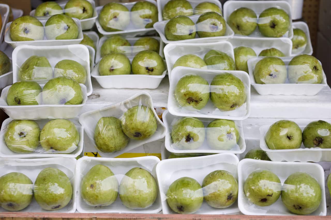 Pears packaged in plastic wrap.