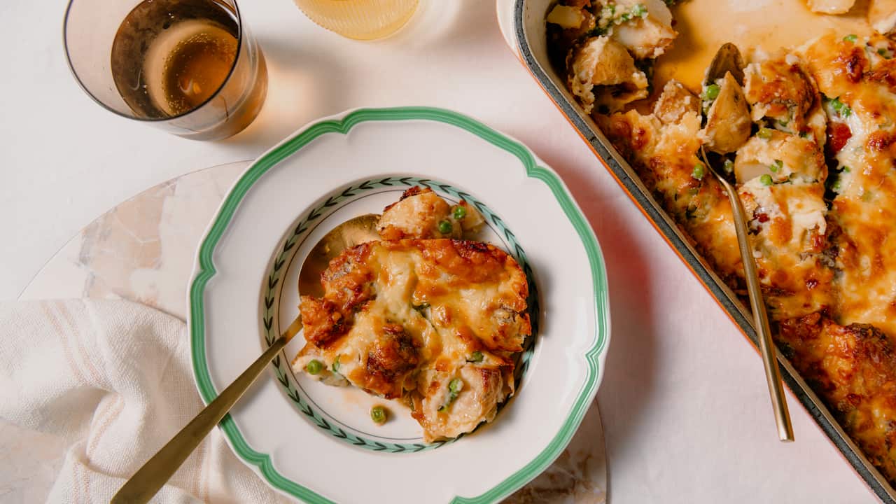 Sausage, potato and pea bake