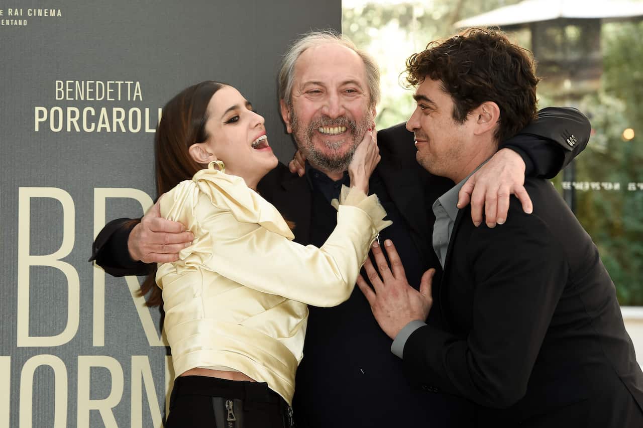Italian actress Benedetta Porcaroli, Italian director Giuseppe Piccioni and Italian actor Riccardo Scamarcio during the photocall for the presentation of the film L'ombra del giorno.