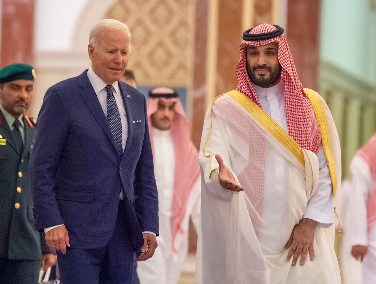 Prince Mohammed bin Salman bin Abdulaziz Al Saud (right) stands next to US President Joe Biden (left). 