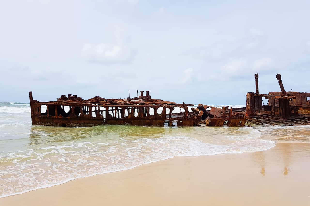 Shipwreck is seen on a beach