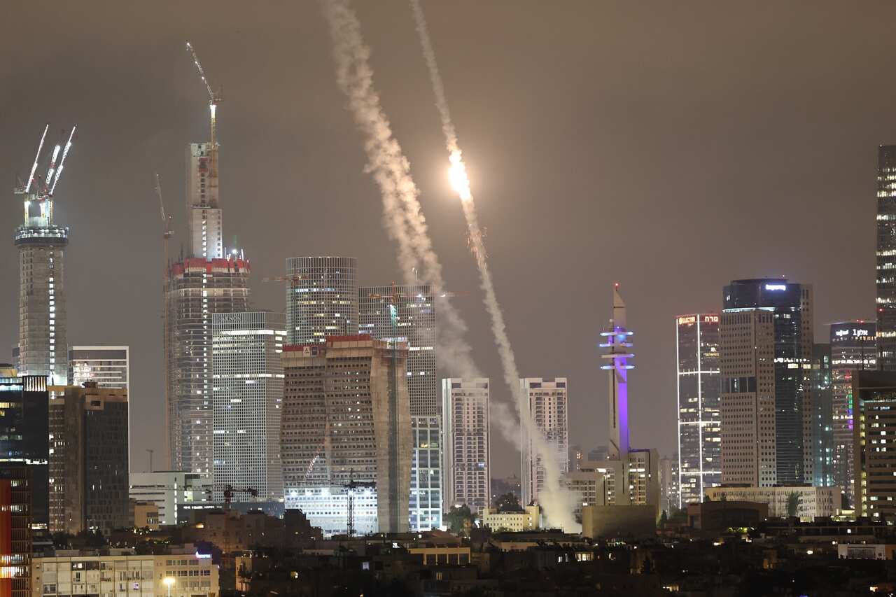 Israel's Iron Dome intercepts ballistic missiles fired from Iran over Tel Aviv



