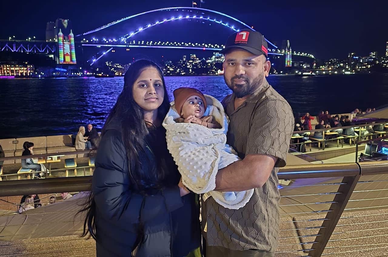 Danushanth with his wife and child