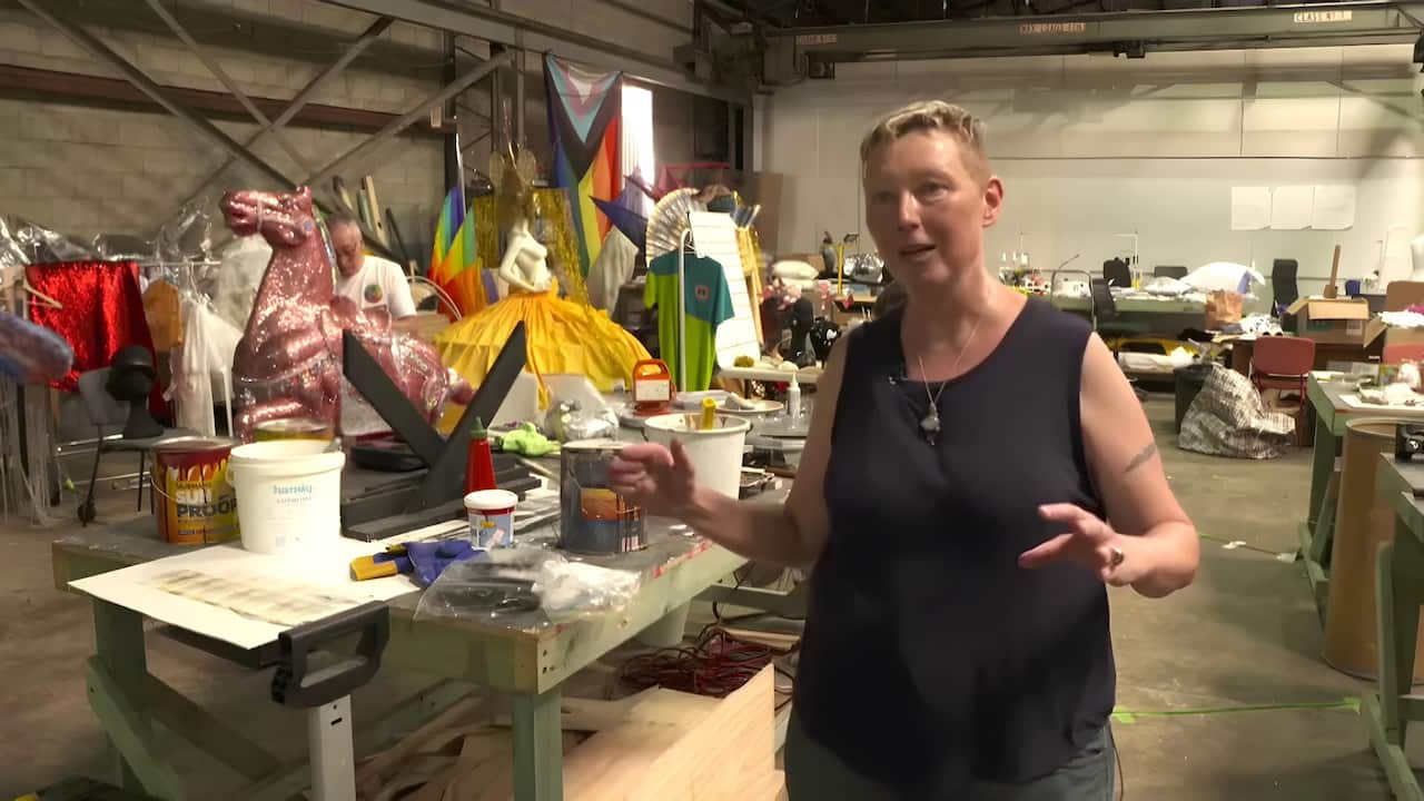 Liz Carter in the Mardi Gras workshop (AP).jpg
