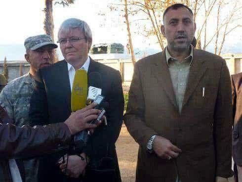 Two men in suits.