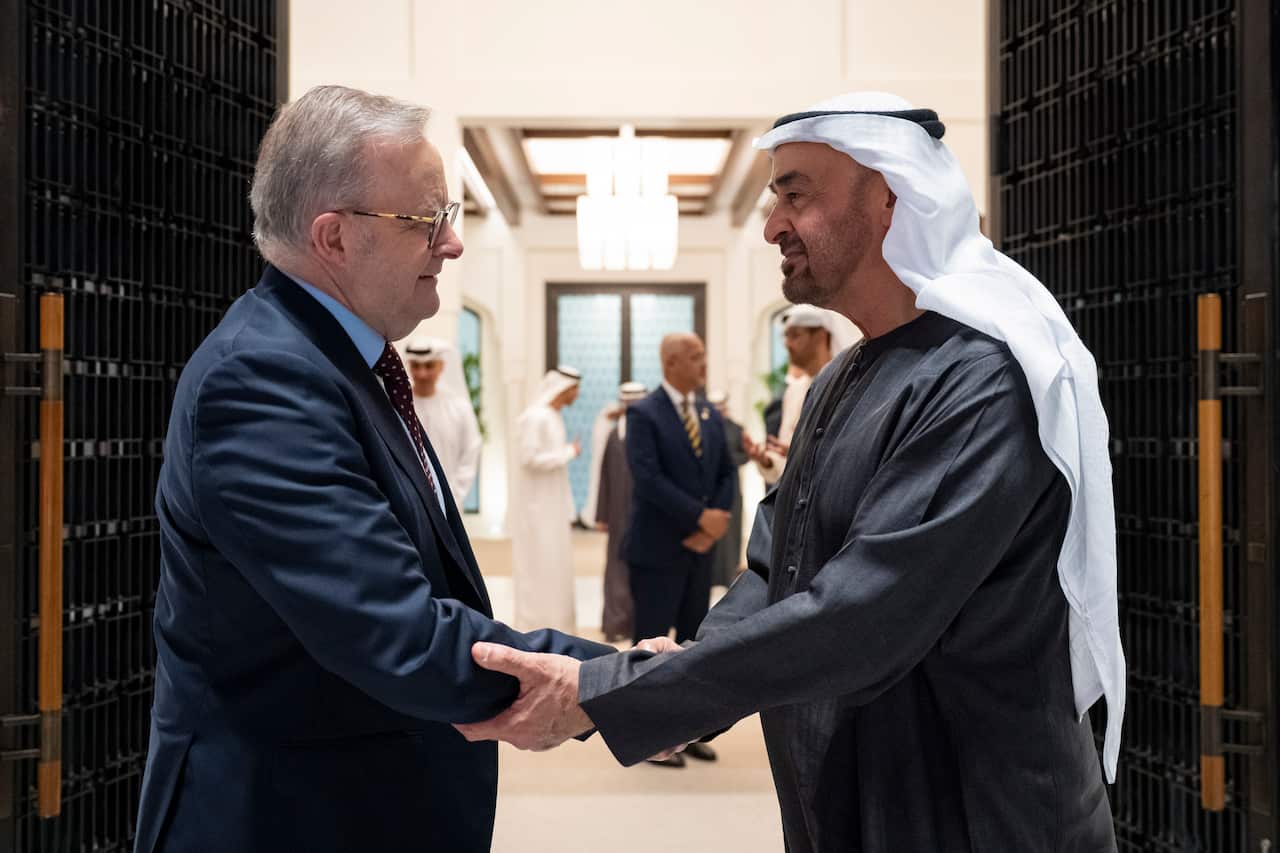 Two men shaking hands.