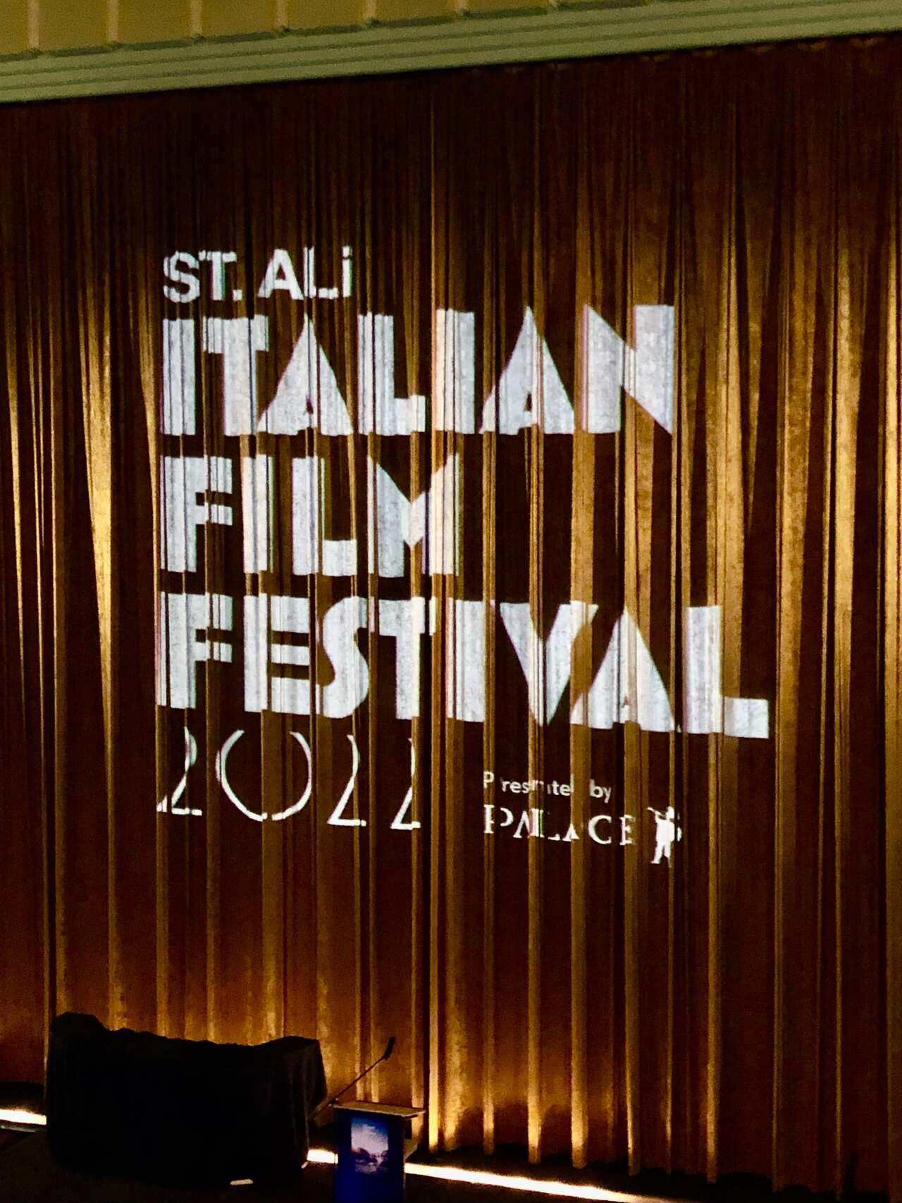 The big screen behind curtains at the Astor Theatre