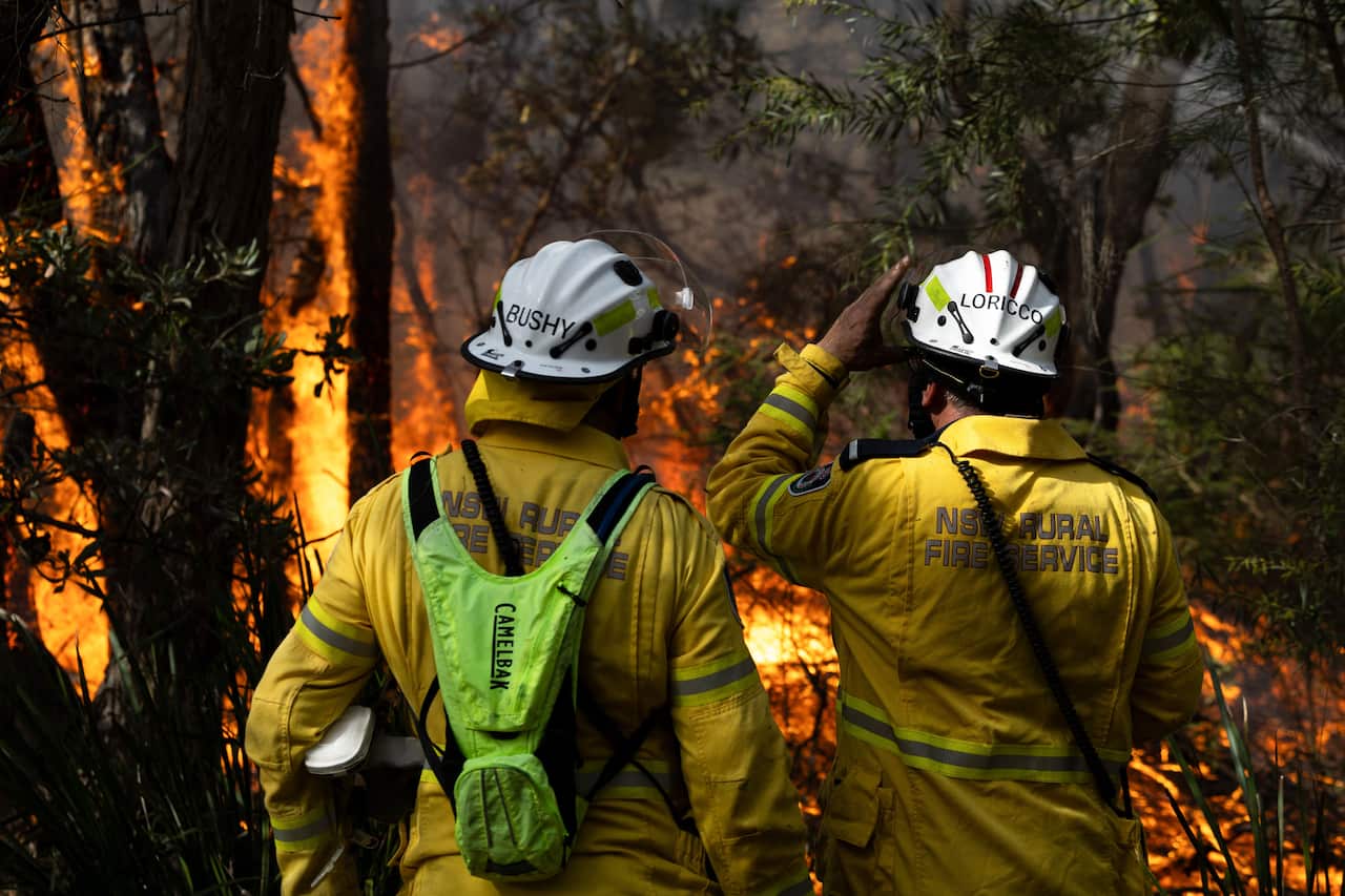 Volunteer firefighters monitoring a hazard reduction burn