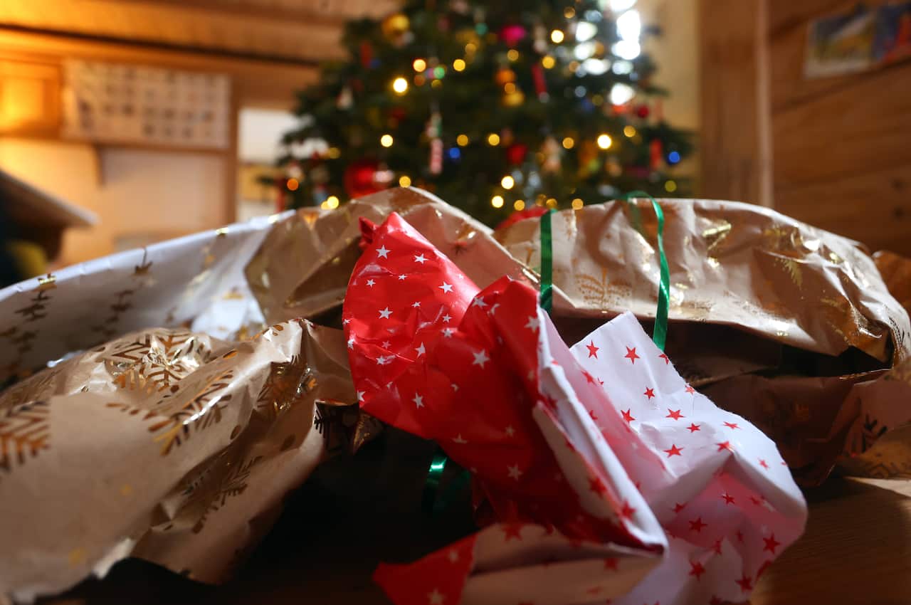 A pile of Christmas wrapping paper. 