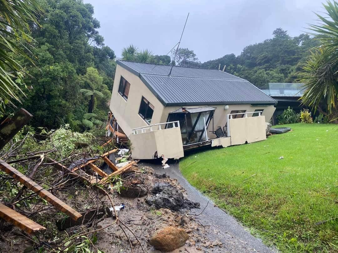 Houses at Muriwai Beach have been damaged by mud slides caused by cyclone Gabrielle, 24 02 2023