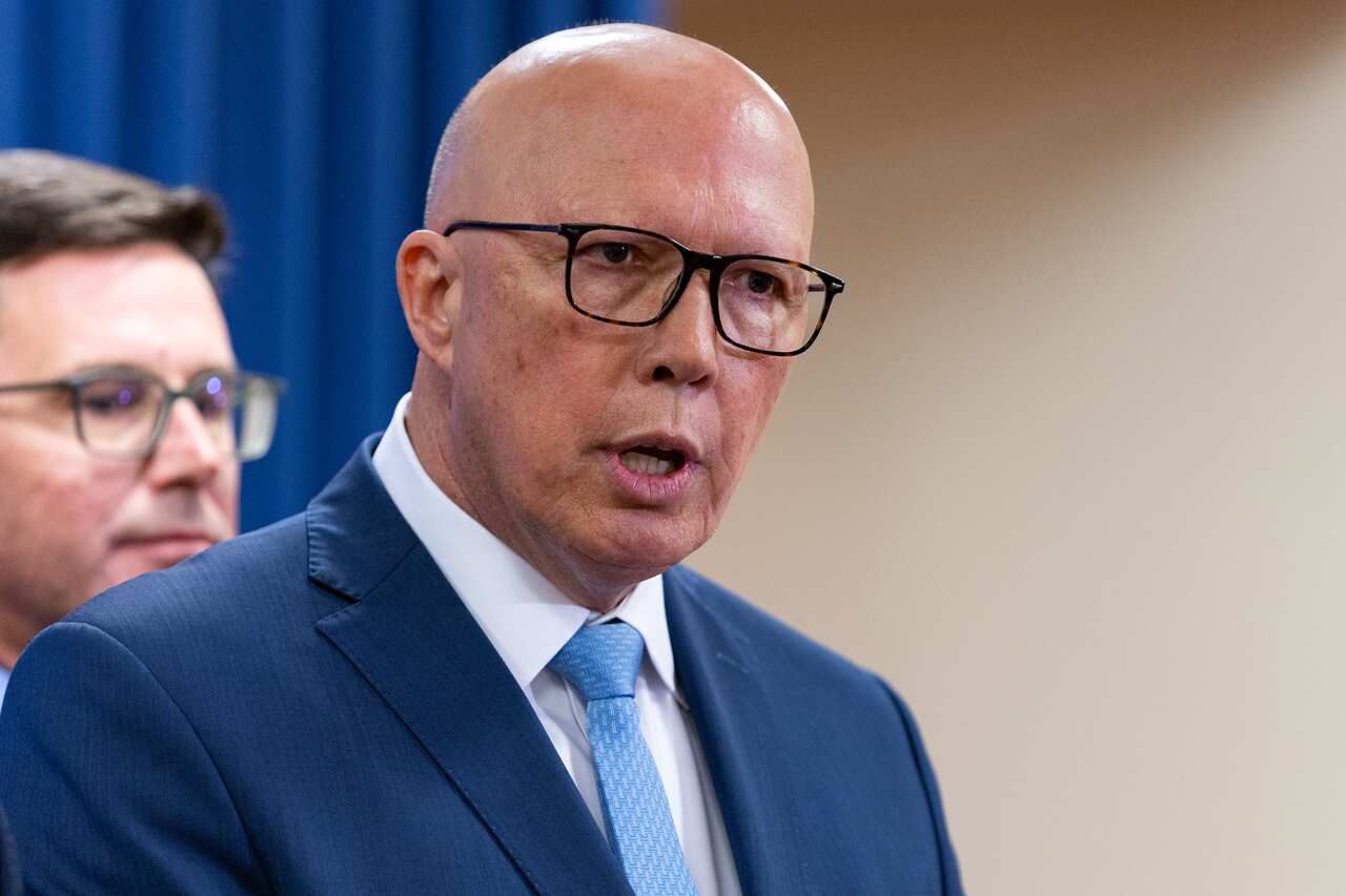 Peter Dutton in a suit and tie