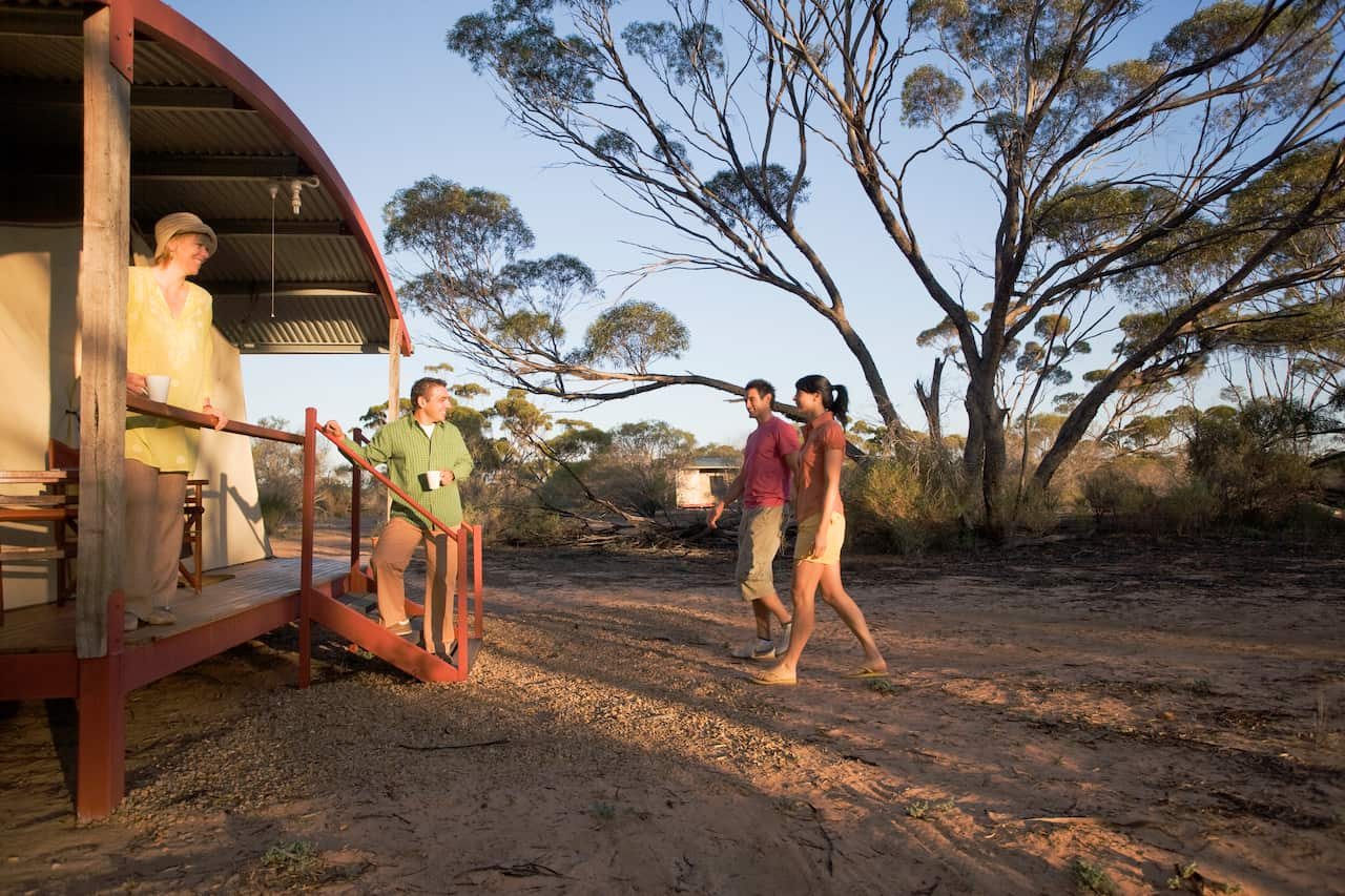 Tourists Socializing at Campsite