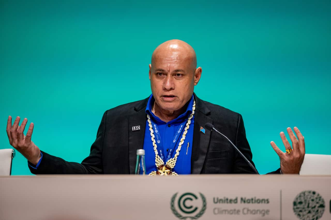 A man speaking at a podium.