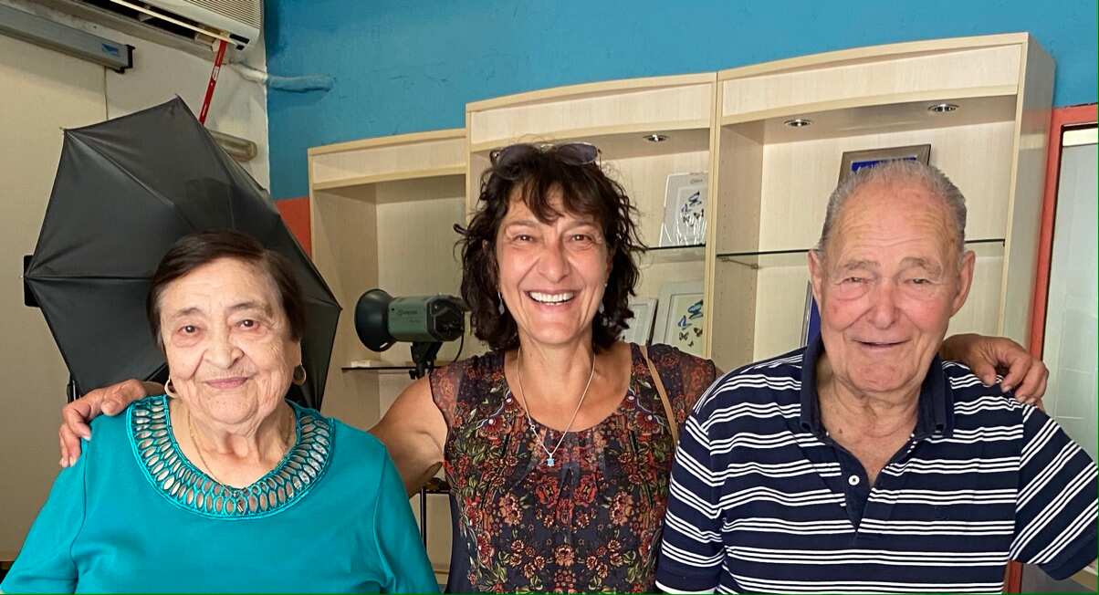 Maria with her parents.jpg