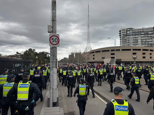 Protesters clash in Melbourne as rival rallies unfold across the