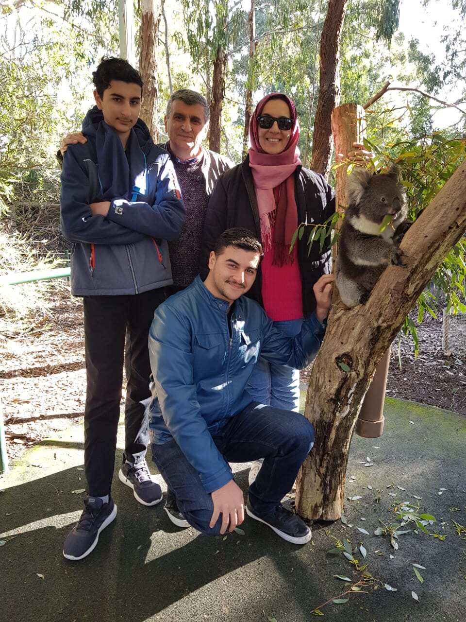 Dr Majed Al Sayegh and Dr Mauida Hasoon with family.png