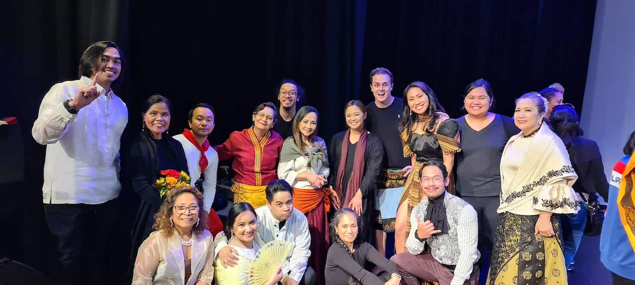 Kareem Acdal with the Filipino community.jpg