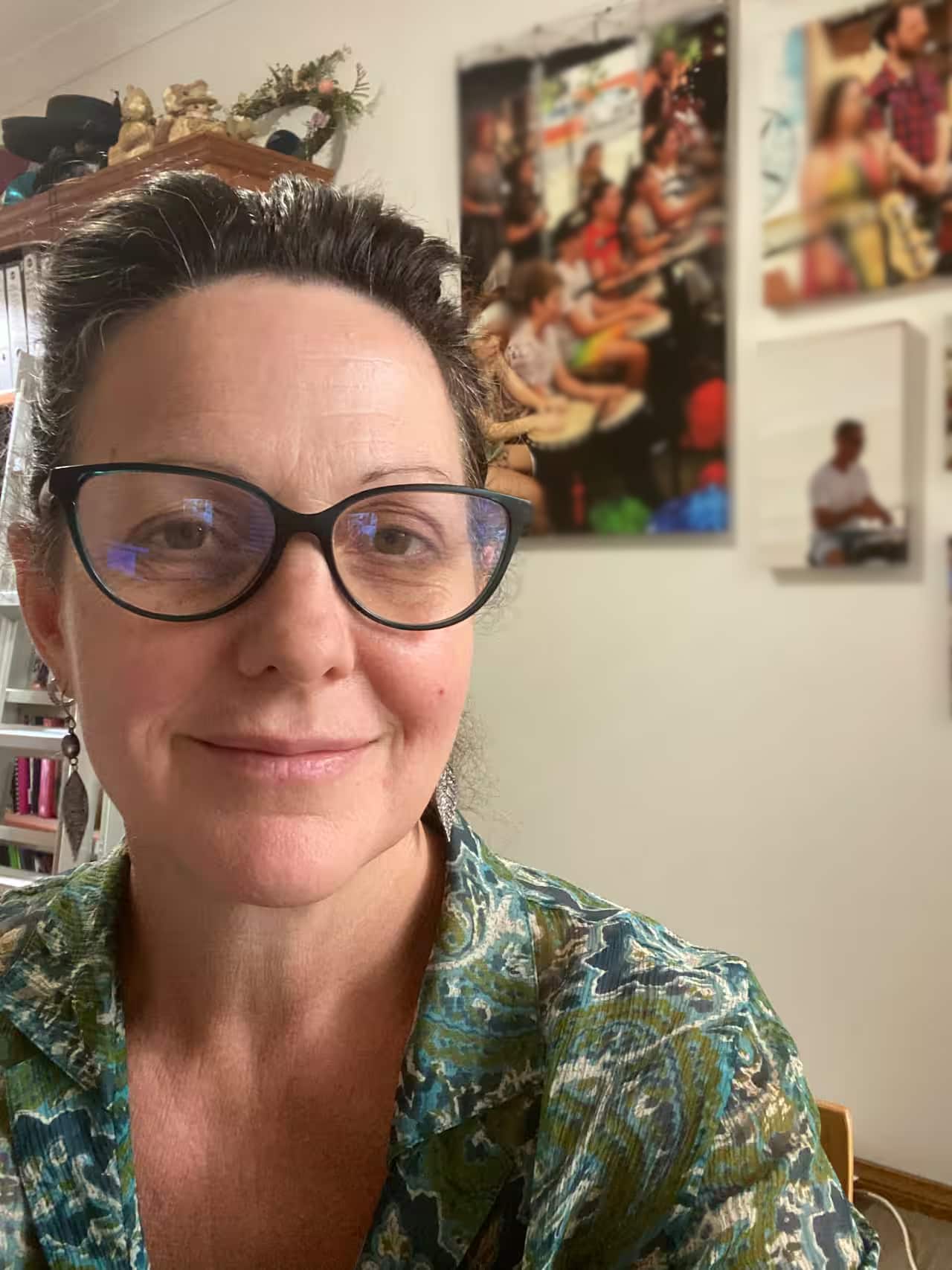 A selfie of a middle-aged woman with glasses.
