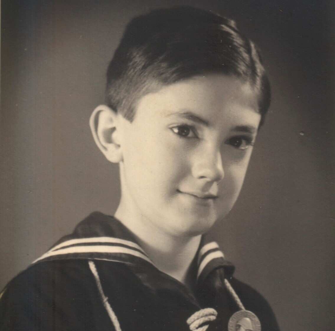John Maneschi in a portrait as a child in 1940.