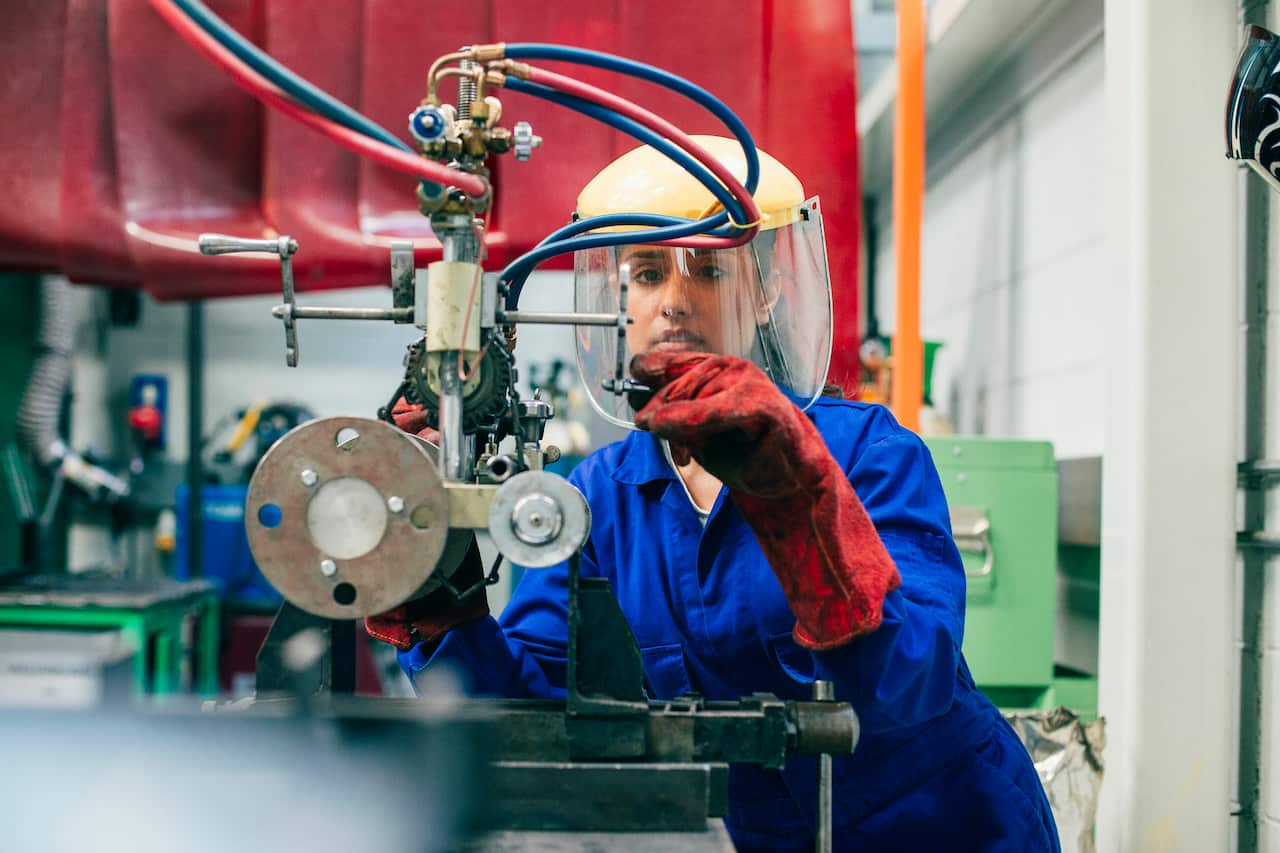 Young Woman Working in the Engineering Workshop