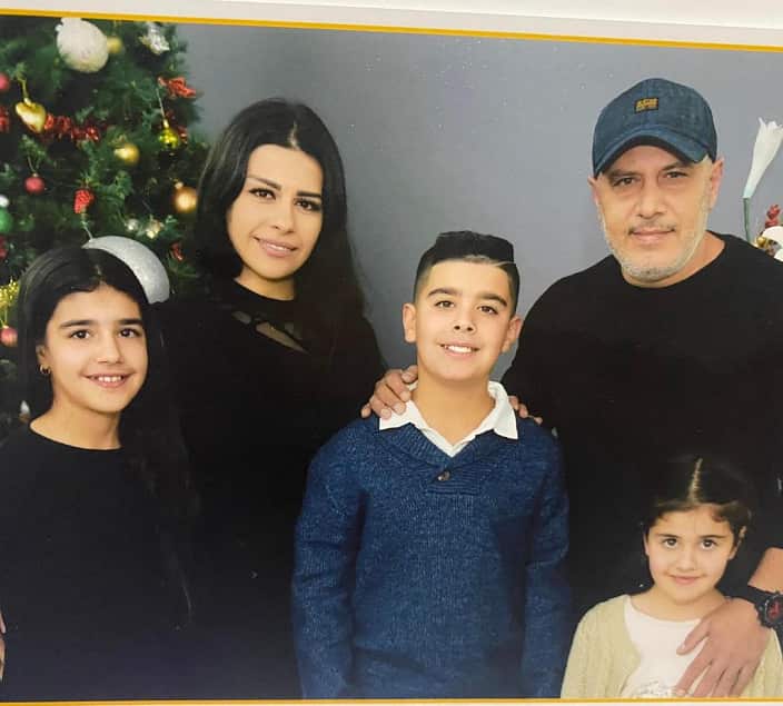 Sarah with her family.png