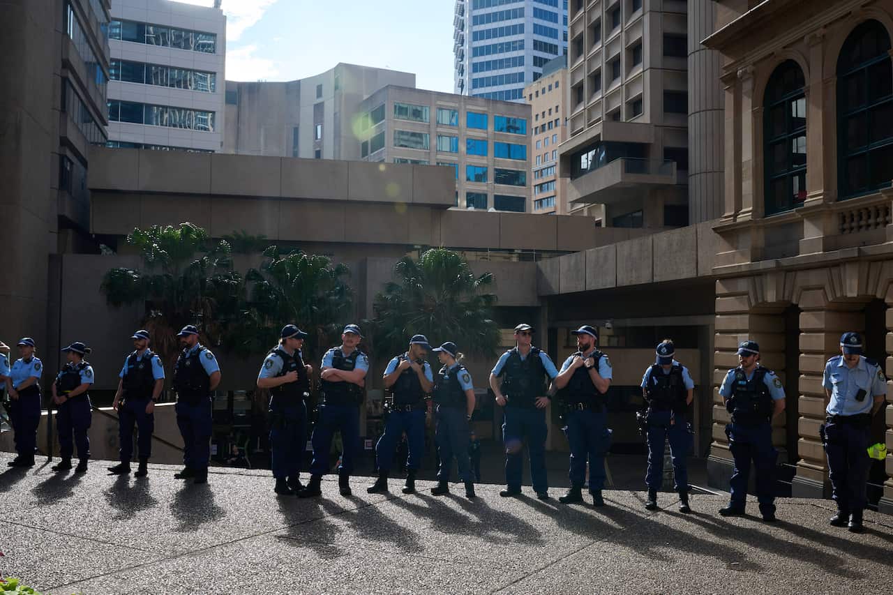 Uniformed police forming a line in Sydney's CBD 