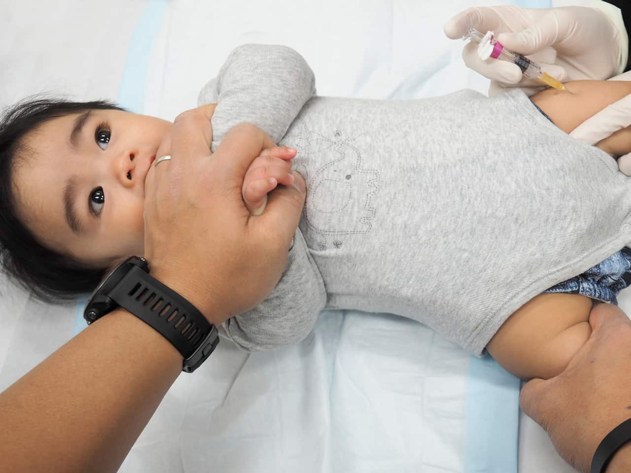 Baby getting his six months vaccination