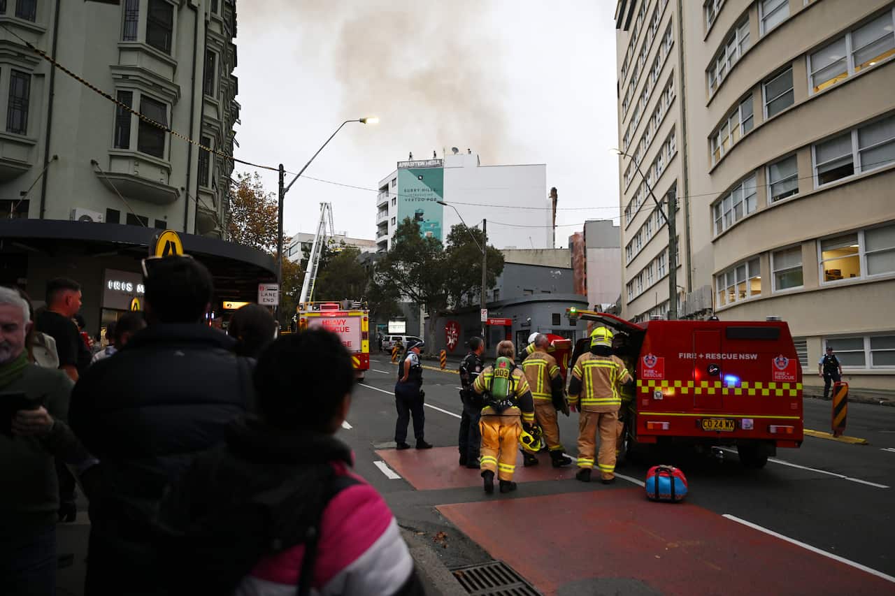 Firefighters at the scene of a building fire.
