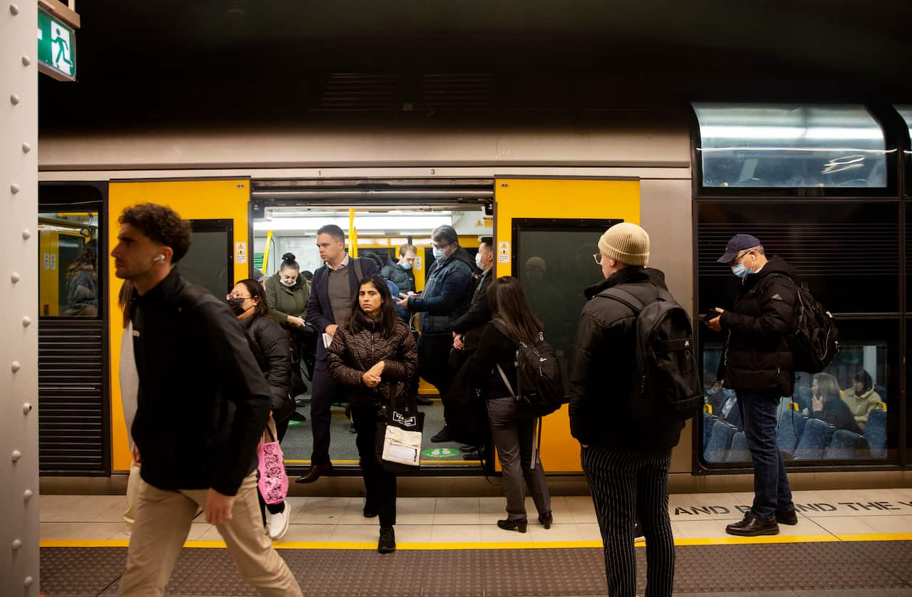 Commuters navigate morning peak at Wynyard train station in Sydney on Thursday, 30 June 2023.