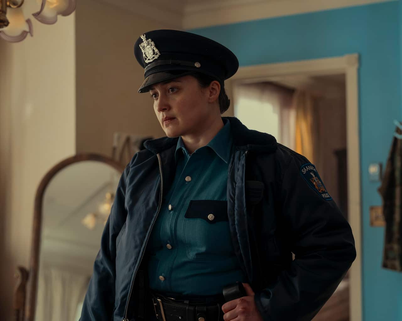 Lily Gladstone as police officer Cam Bentland in 'Under the Bridge'.