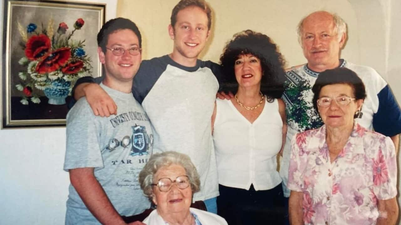 Shaun with his parents, brother and grandmothers.