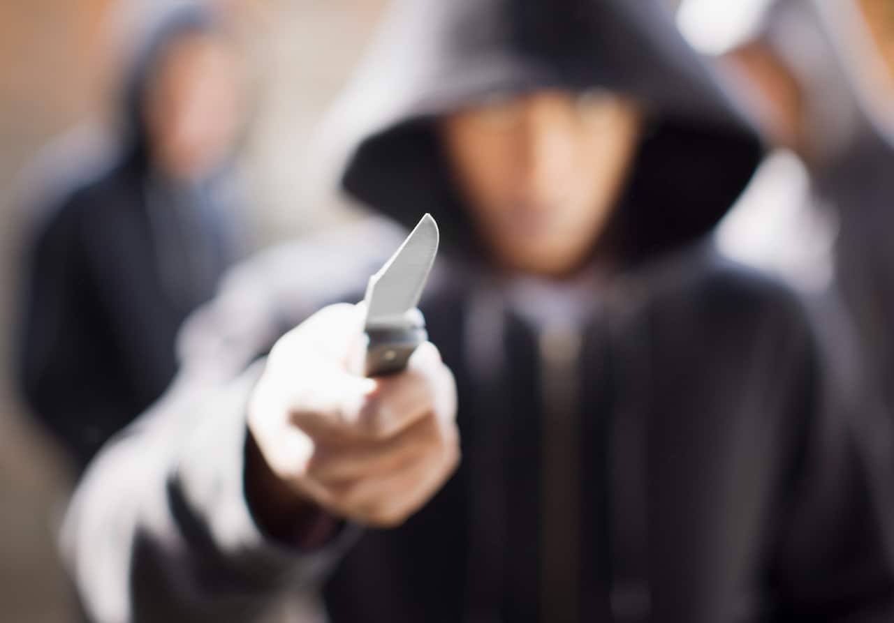 Man threatening with pocket knife