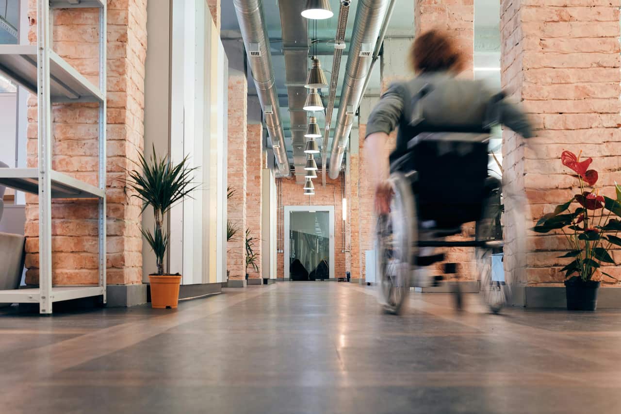 Disable person on wheelchair.  Picture courtesy of Marcus Aurelius in pexels
