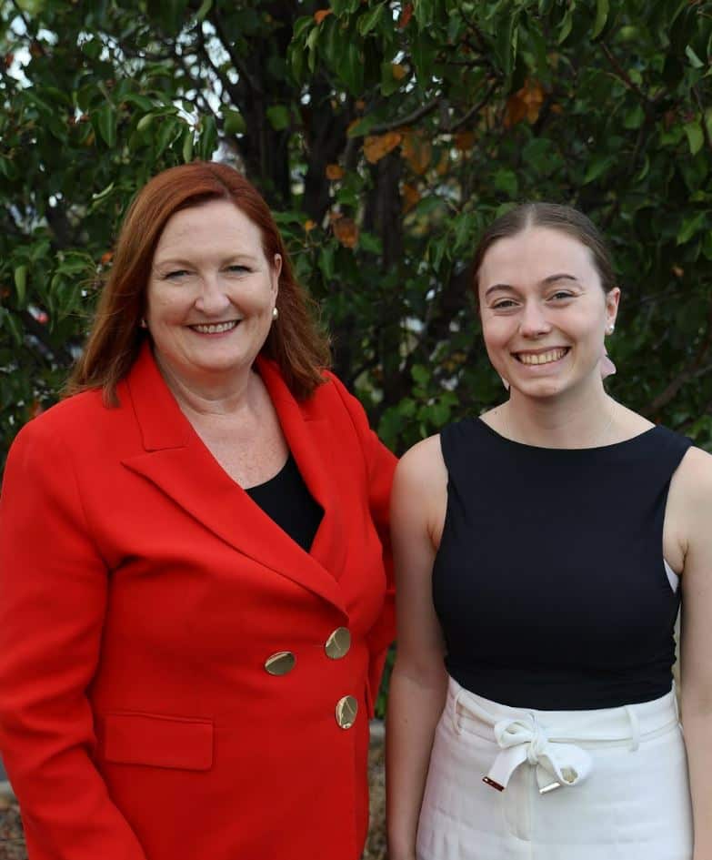 Two women smiling