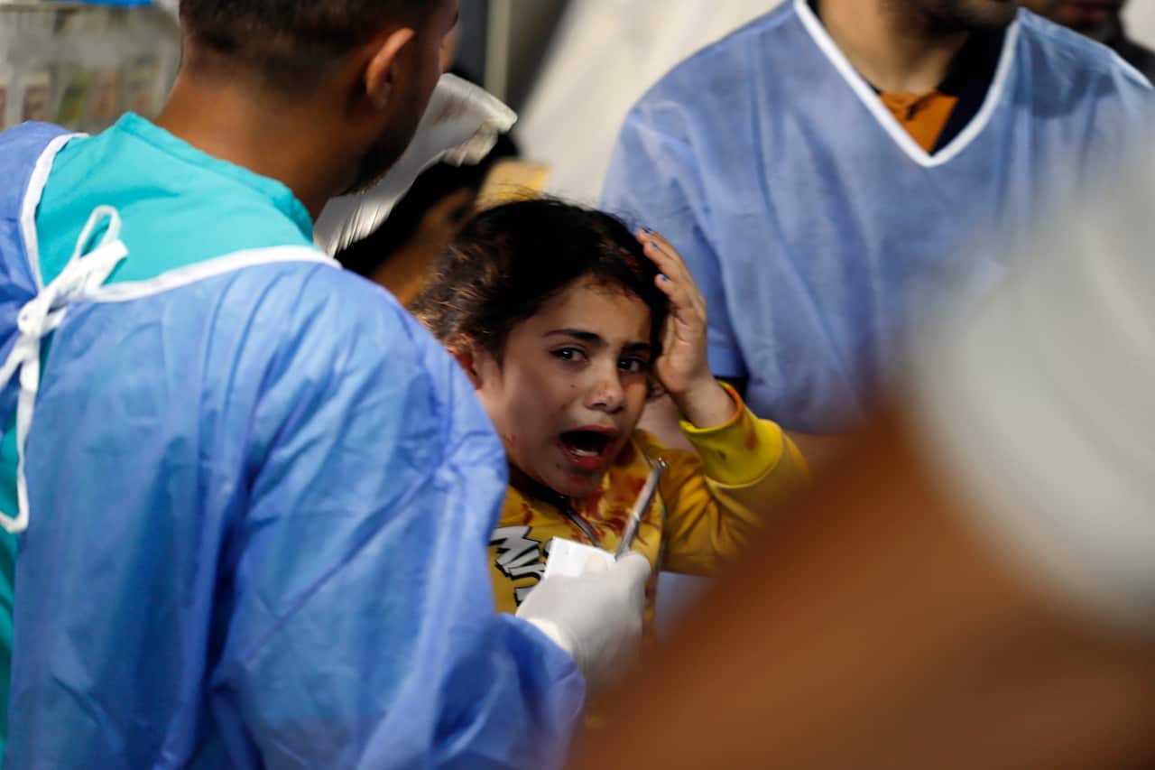An injured child being treated in hospital
